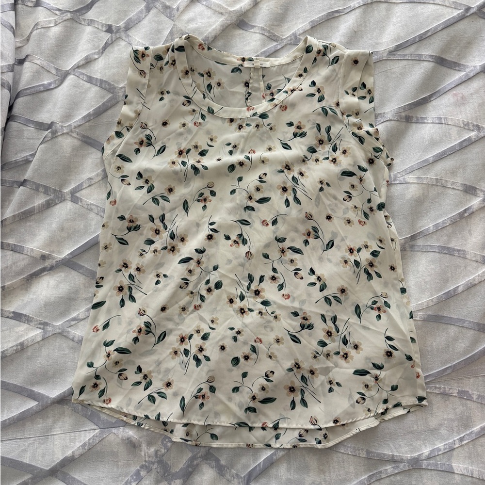 Like new Pleione blouse with floral pattern.  Pleat on back.  Size large.